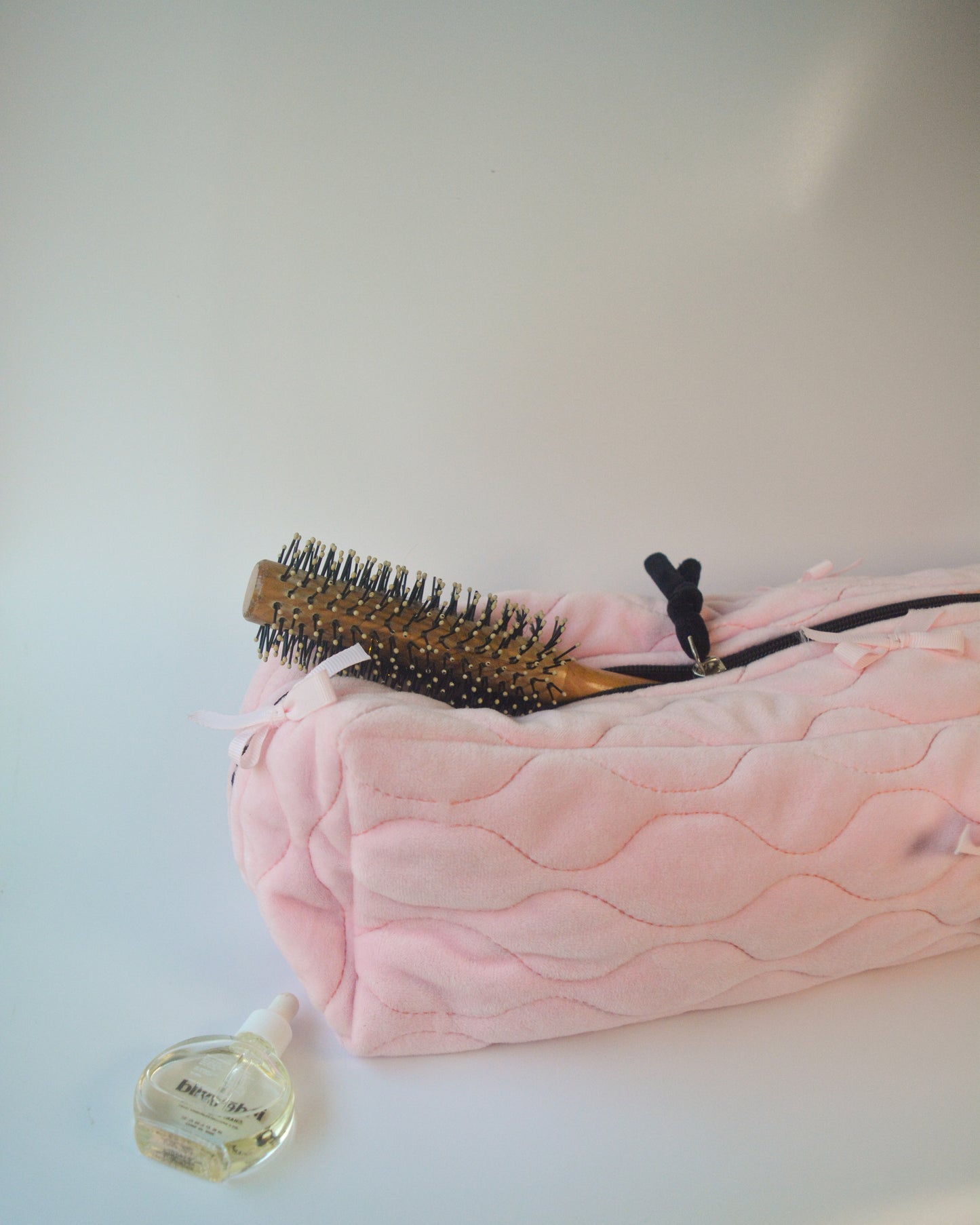 PINK BOWS QUILTED LONG SECTIONS POUCH