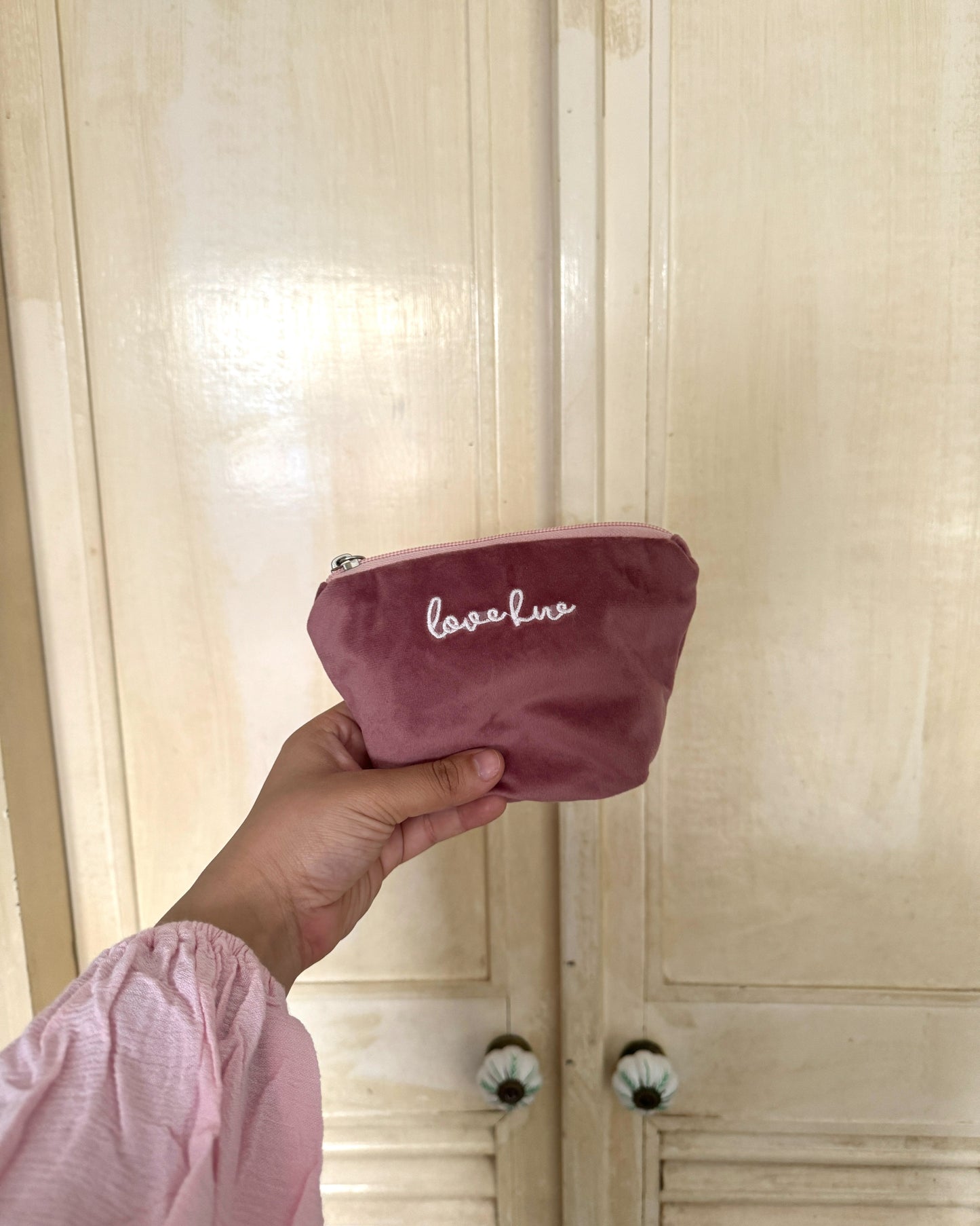 SWANS COIN PURSE IN MAUVE
